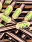 Cigare en chocolat noir et pâte de pistache (à l'unité)