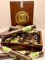 Cigare en chocolat noir et pâte de pistache (à l'unité)