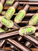 Cigare en chocolat noir et pâte de pistache (à l'unité)