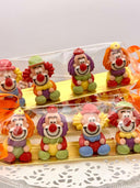 Réglette de quatre clowns du Carnaval de Nice en sucre