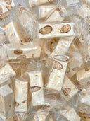 Soft white nougats in papillotes